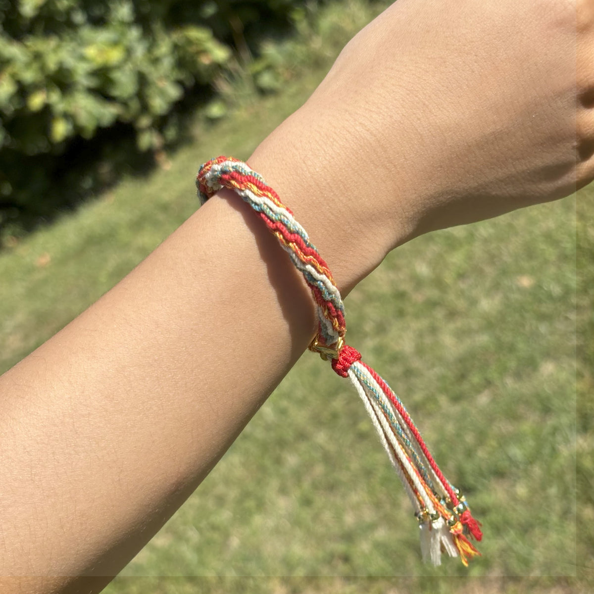 Soleil Nomade – Bracelet tressé multicolore